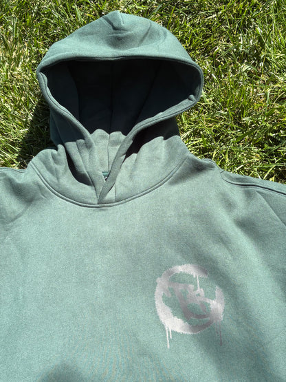 Green hoodie with a logo 