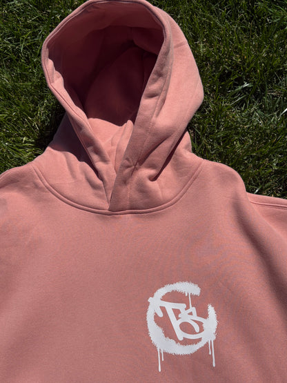 Pink hoodie with a white logo 
